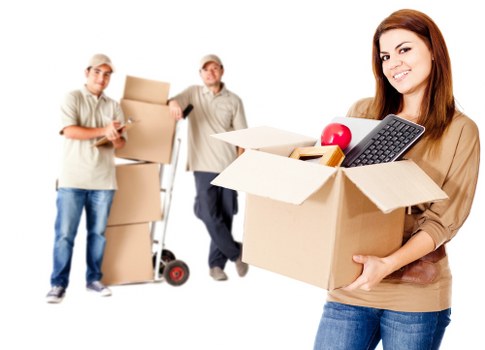 Packed moving boxes and labeled items ready for transport