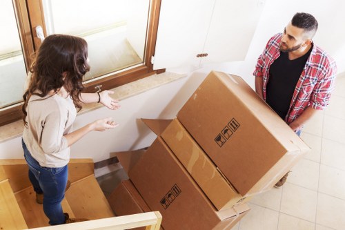Professional East Barnet moving team handling boxes and furniture