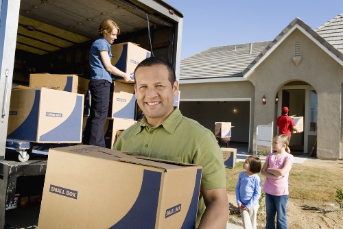 Professional office removals Eastbarnet team handling desks and furniture