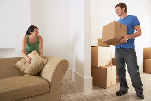 Careful packing and narrow staircase access during a flat move
